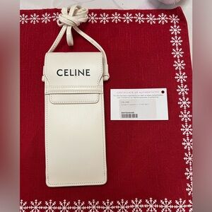 Celine GLASSES CASE ONLY.. no sunglasses! 


Celine crossbody glasses pouch.